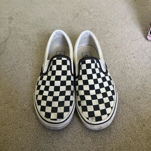 Black and White Checkered Vans
Good condition
A little worn in